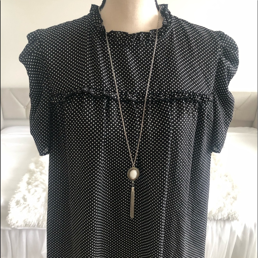 Polka dot blouse perfect for a little flare sz L